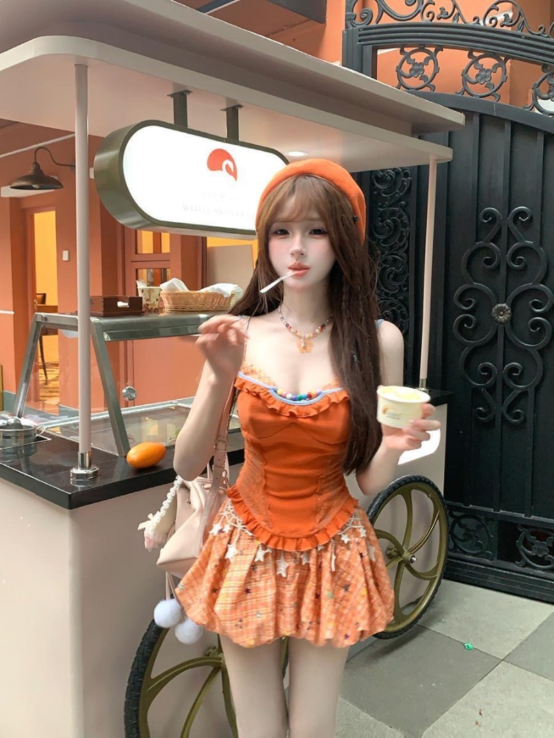 طقم صيفي جديد برتقالي اللون من - مراجعة Summer Clothing Model وسعره